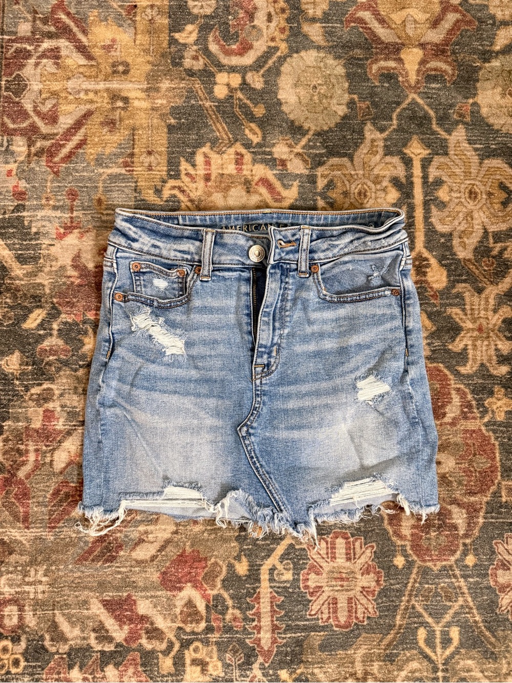 American Eagle Outfitters Light Blue Distressed Denim Mini Skirt with Frayed Hem